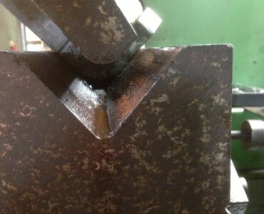An image of us using the brake press